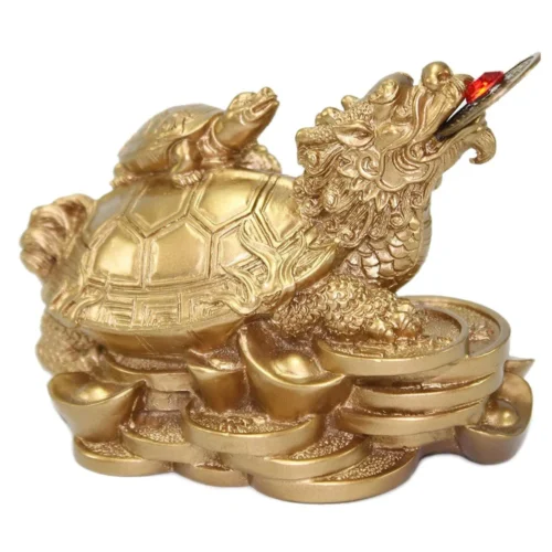 Golden Feng Shui Dragon Turtle statue with a coin in its mouth, sitting atop gold ingots and coins, symbolizing wealth, protection, and prosperity